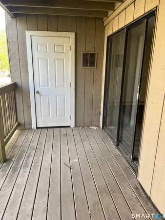 a view of wooden floor in a balcony