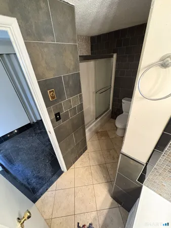 a bathroom with a sink and toilet