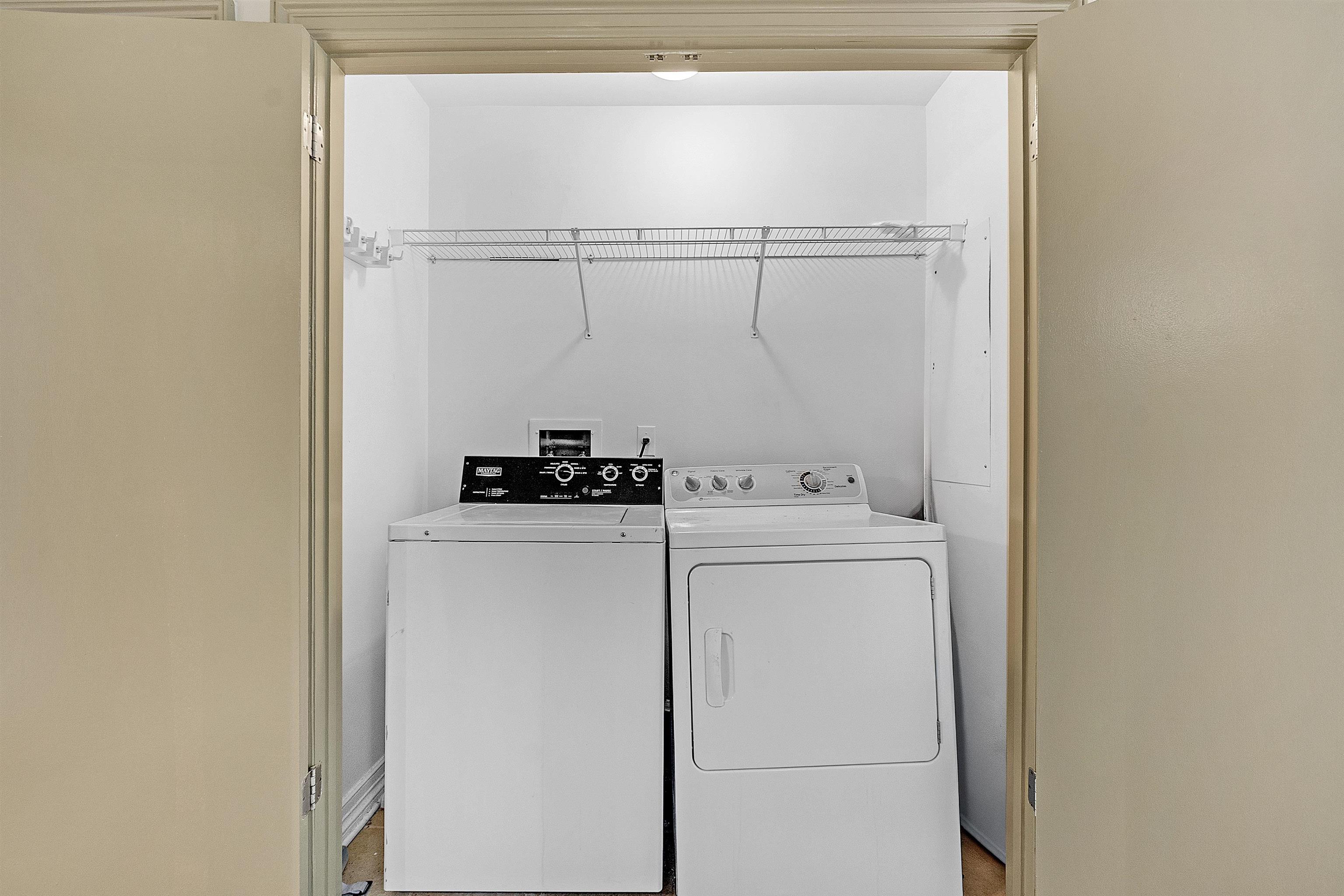655 Riverside Drive, Unit 206 Memphis, TN 38103 - Photo 19 of 28 a utility room with dryer and washer