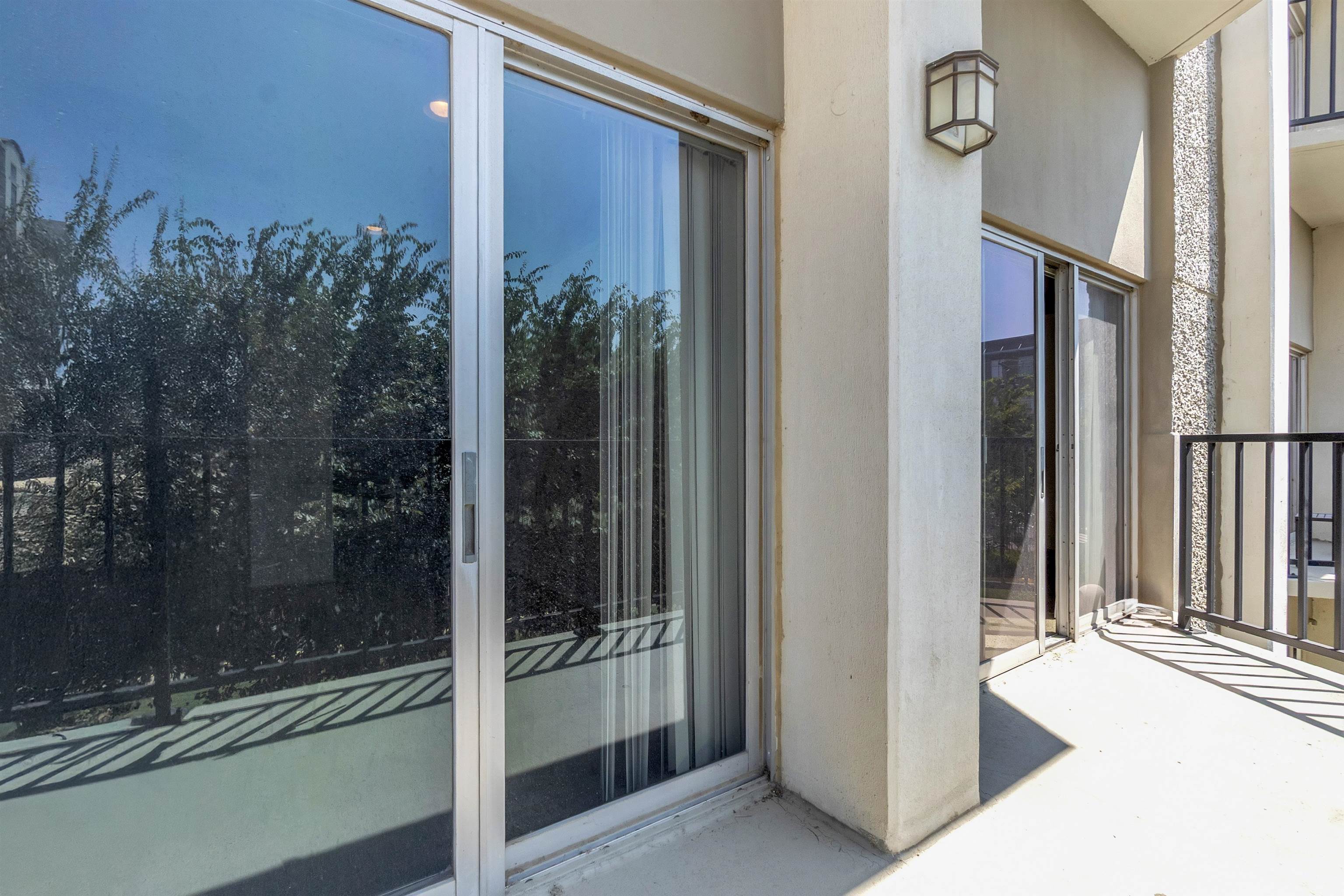 655 Riverside Drive, Unit 206 Memphis, TN 38103 - Photo 25 of 28 a bathroom with a shower and a sink