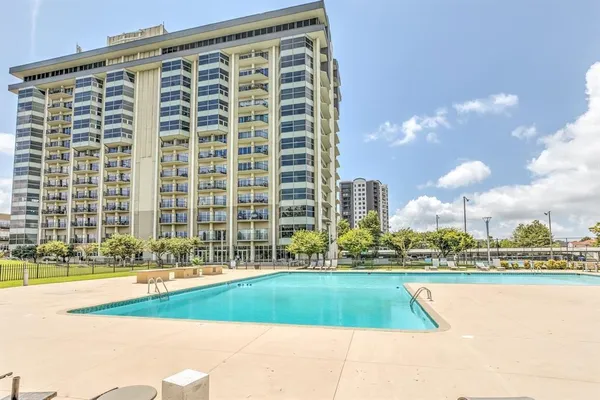 a view of swimming pool outdoor outdoor space and seating area