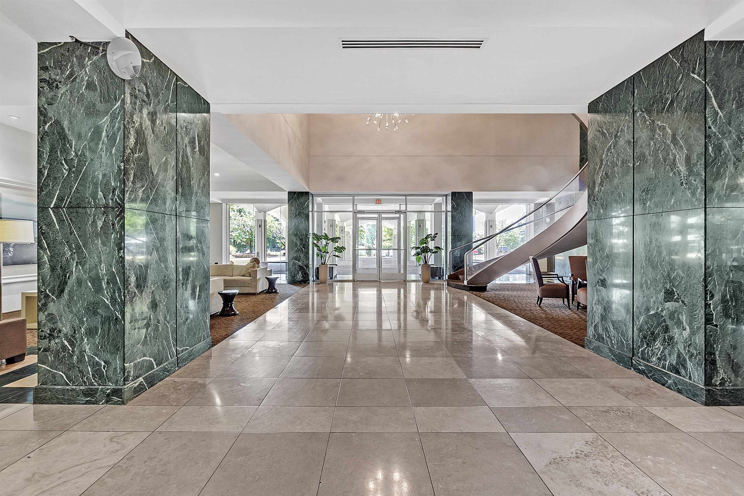 655 Riverside Drive, Unit 206 Memphis, TN 38103 - Photo 6 of 28 a view of interior space with balcony and furniture