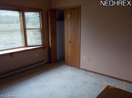 1742 Doyle Road Jefferson, OH 44047 - Photo 5 of 13 formal diningroom overlooks the front yard with a large bright sunny window