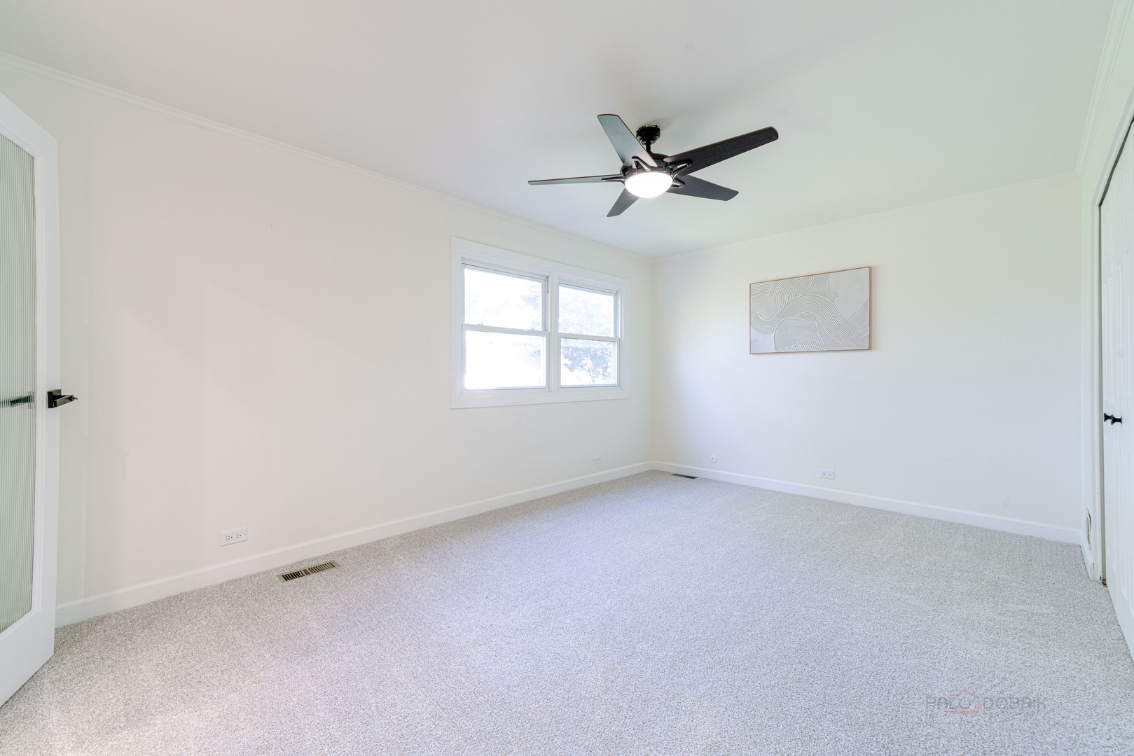 887 Saybrook Lane Buffalo Grove, IL 60089 - Photo 16 of 28 a view of an empty room with a window