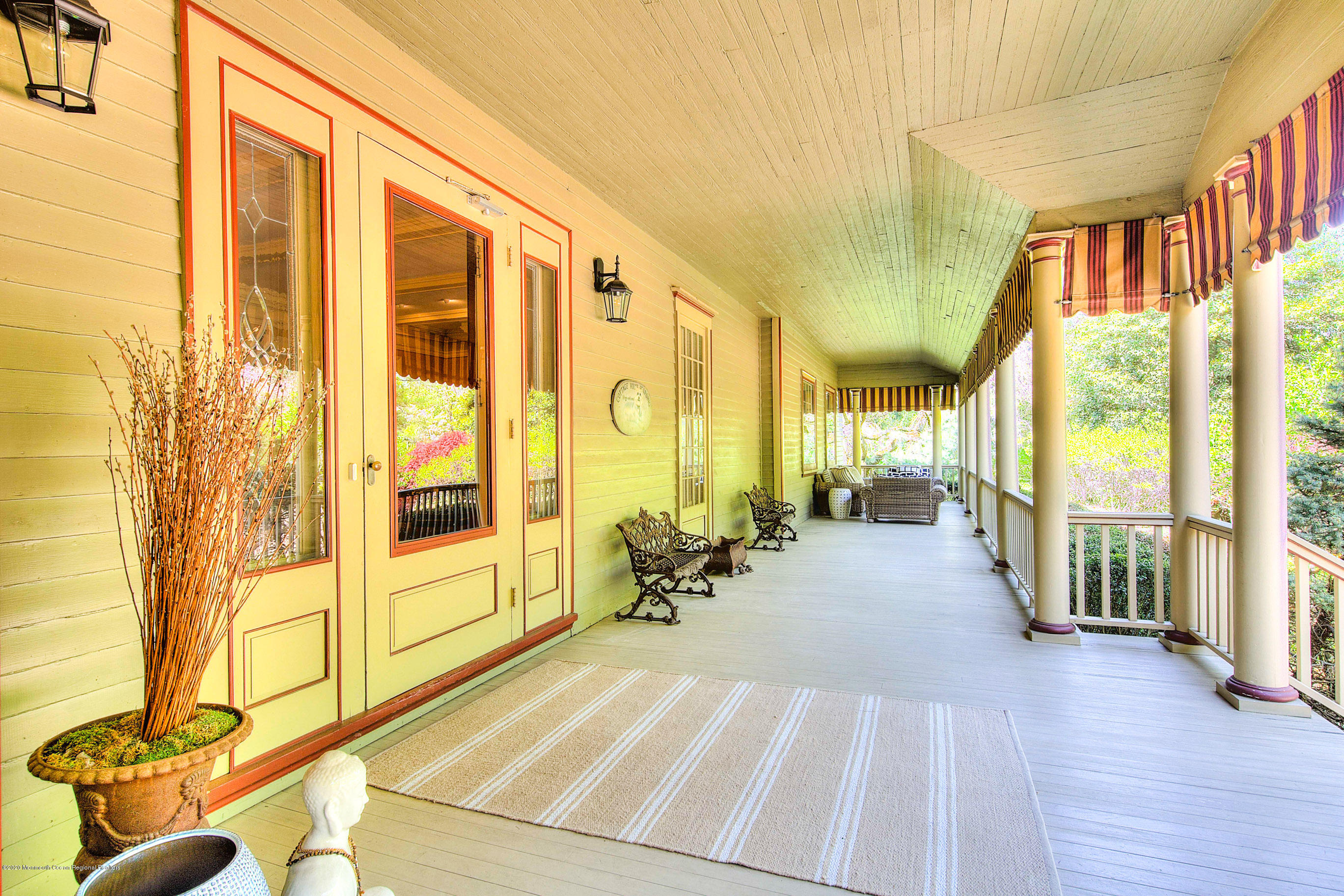 59 Rumson Road Rumson, NJ 07760 - Photo 3 of 62 a lobby with furniture and floor to ceiling windows
