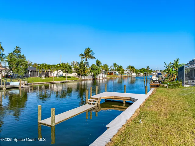 a view of a house with a garden
