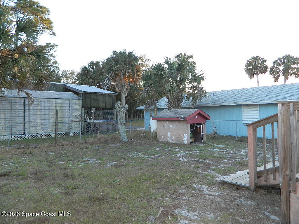 3755 Main Street Sebastian, FL 32976 - Photo 12 of 12 a view of a house with a yard