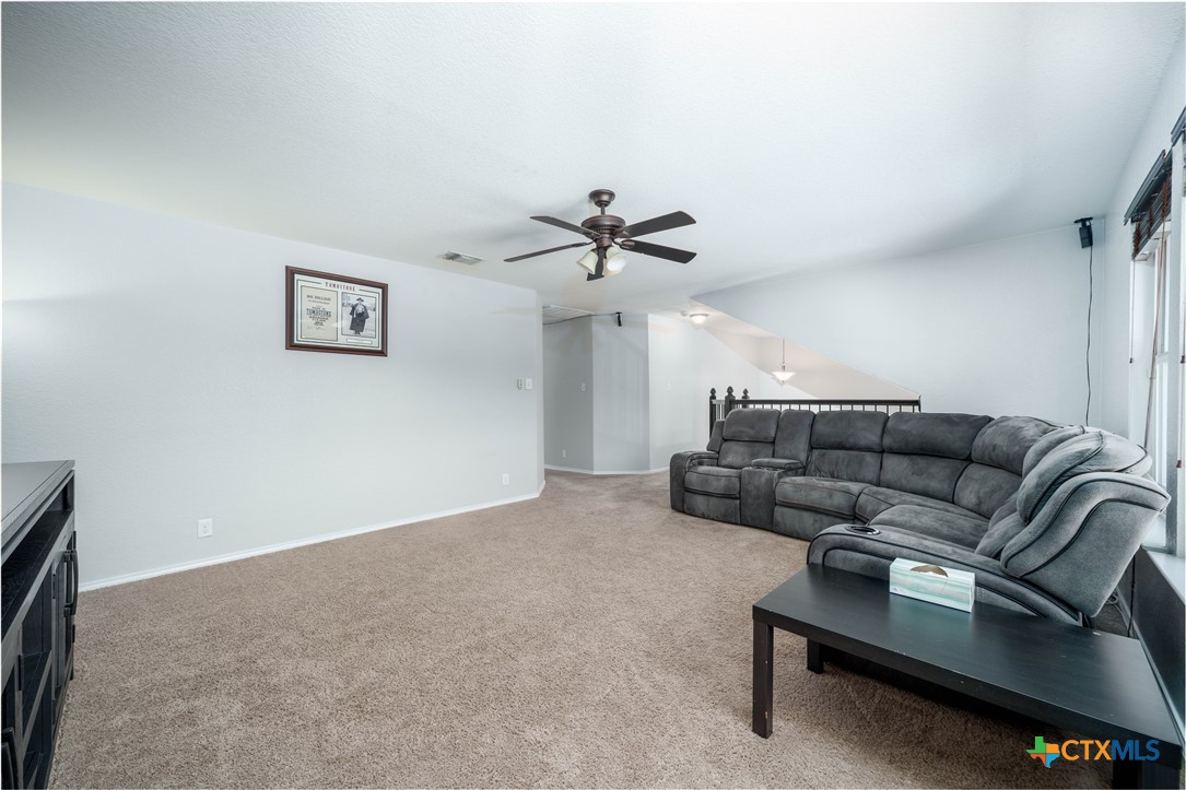 232 Pevero Cibolo, TX 78108 - Photo 16 of 42 a living room with furniture and a ceiling fan