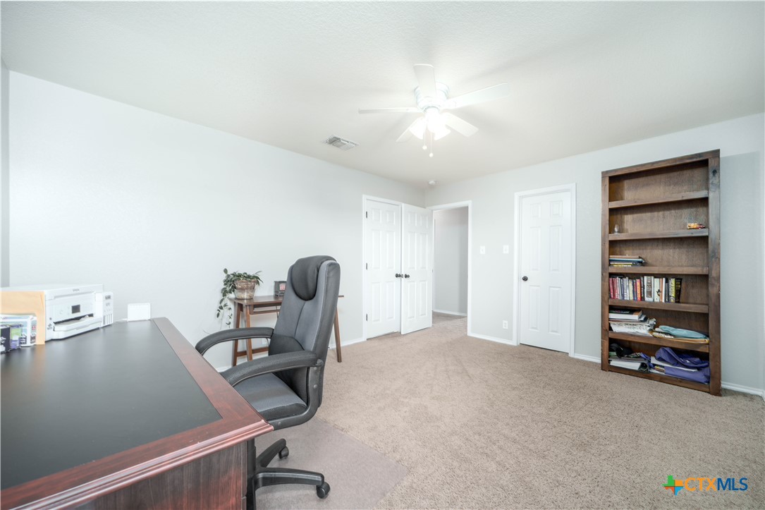 232 Pevero Cibolo, TX 78108 - Photo 21 of 42 a view of a workspace with furniture and a window