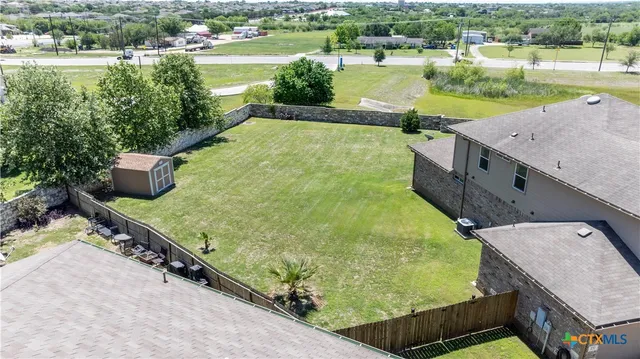 a view of a lake with a city