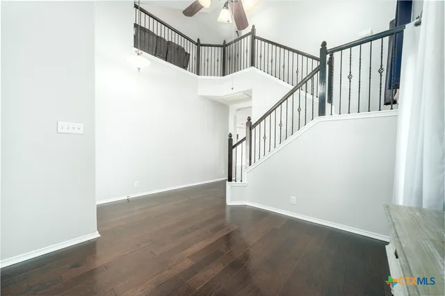 a view of entryway with wooden floor