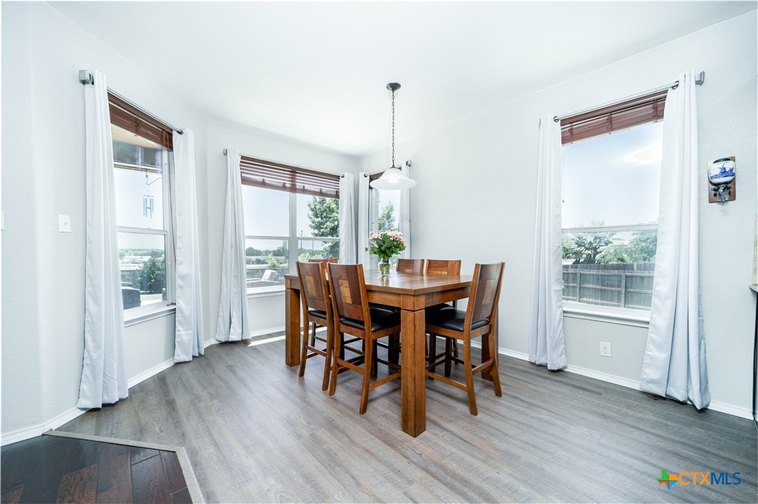 232 Pevero Cibolo, TX 78108 - Photo 7 of 42 a dining room with furniture window wooden floor
