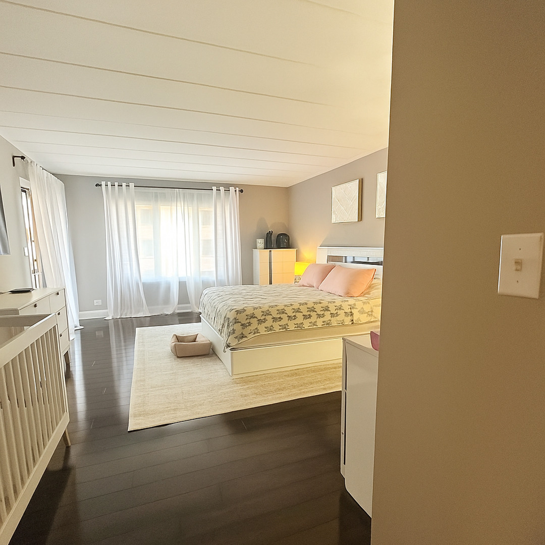 905 Center Street, Unit 208 Des Plaines, IL 60016 - Photo 9 of 24 a bathroom with a sink and a mirror