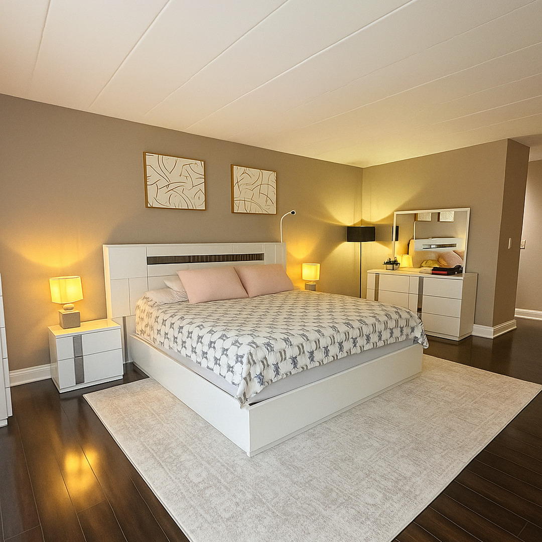 905 Center Street, Unit 208 Des Plaines, IL 60016 - Photo 10 of 24 a bedroom with a bed and wooden floor