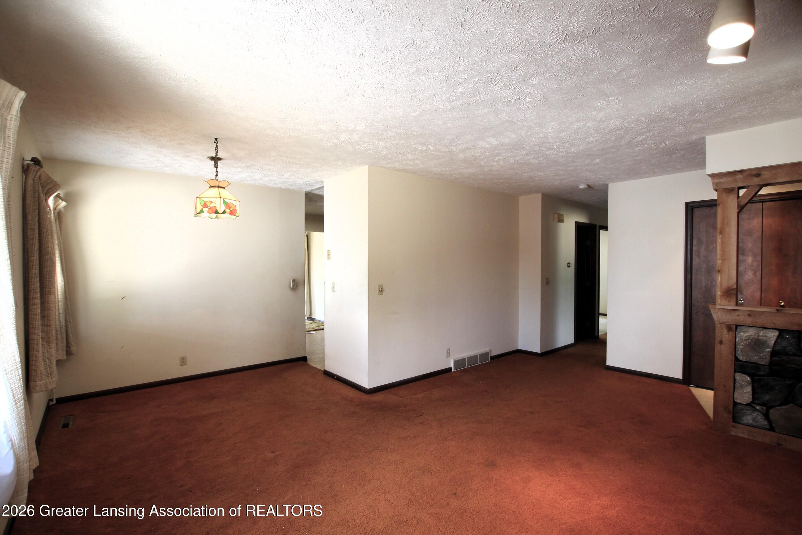 8635 West Herbison Road Eagle, MI 48822 - Photo 13 of 49 Living Room