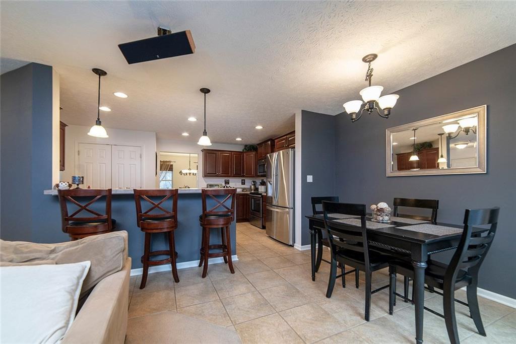 486 Moores Grove Road New Stanton, PA 15672 - Photo 12 of 25 BREAKFAST AREA OPENS TO KITCHEN