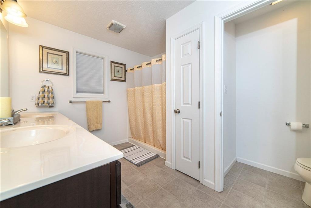 486 Moores Grove Road New Stanton, PA 15672 - Photo 16 of 25 MASTER BATH WITH DOUBLE BOWL VANITY AND WALK IN SHOWER.