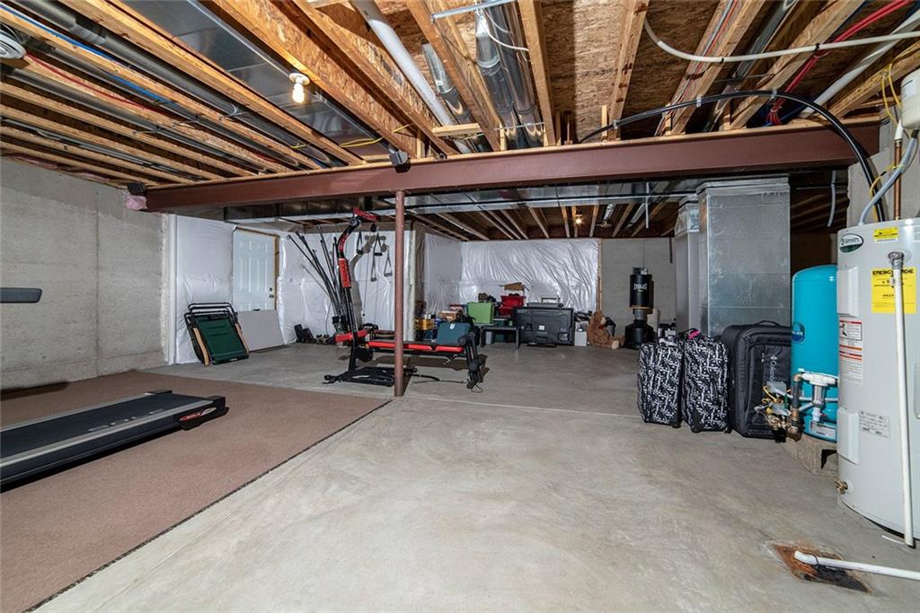 486 Moores Grove Road New Stanton, PA 15672 - Photo 22 of 25 LARGE UNFINISHED FULL BASEMENT WITH WALK OUT TO YARD. JUST WAITING TO BE FINISHED.