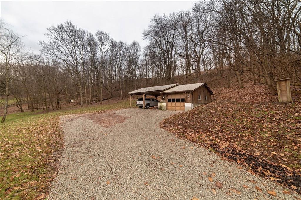 486 Moores Grove Road New Stanton, PA 15672 - Photo 24 of 25 ACCESS TO 2ND GARAGE AREA AND CARPORT.