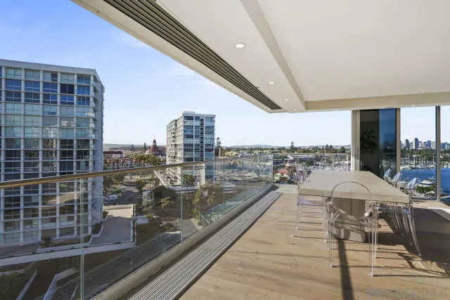 a view of a balcony with city view