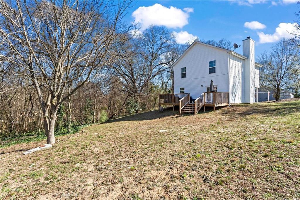 392 4th Street Forest Park, GA 30297 - Photo 21 of 21 a view of a house with a yard