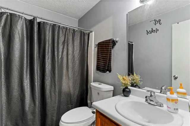 a bedroom with bunk bed and a closet