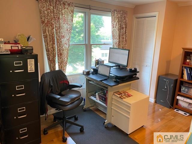 5 Bowser Road New Brunswick, NJ 08901 - Photo 41 of 45 a view of a workspace with furniture and a window