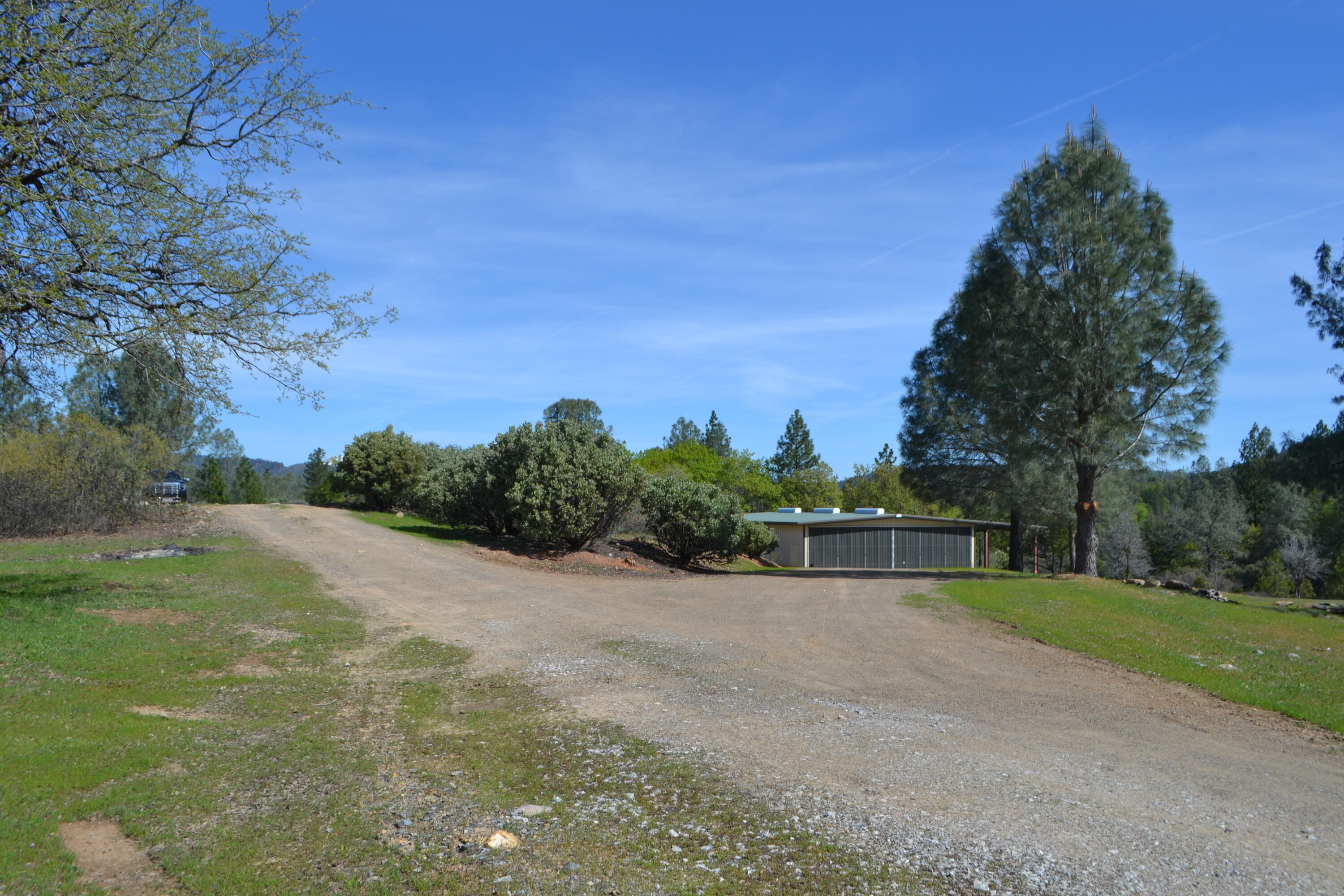 Backbone Road Bella Vista, CA 96008 - Photo 19 of 42 a view of a tennis court