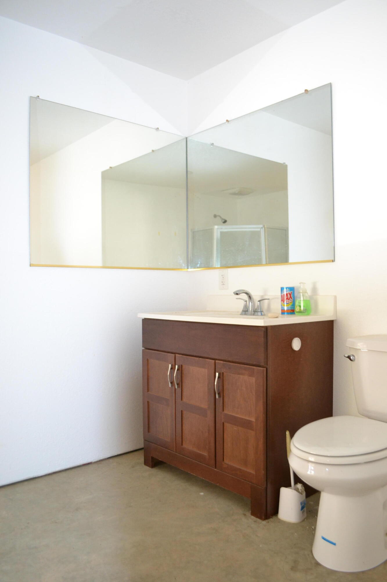 Backbone Road Bella Vista, CA 96008 - Photo 36 of 42 a bathroom with a sink a toilet and mirror