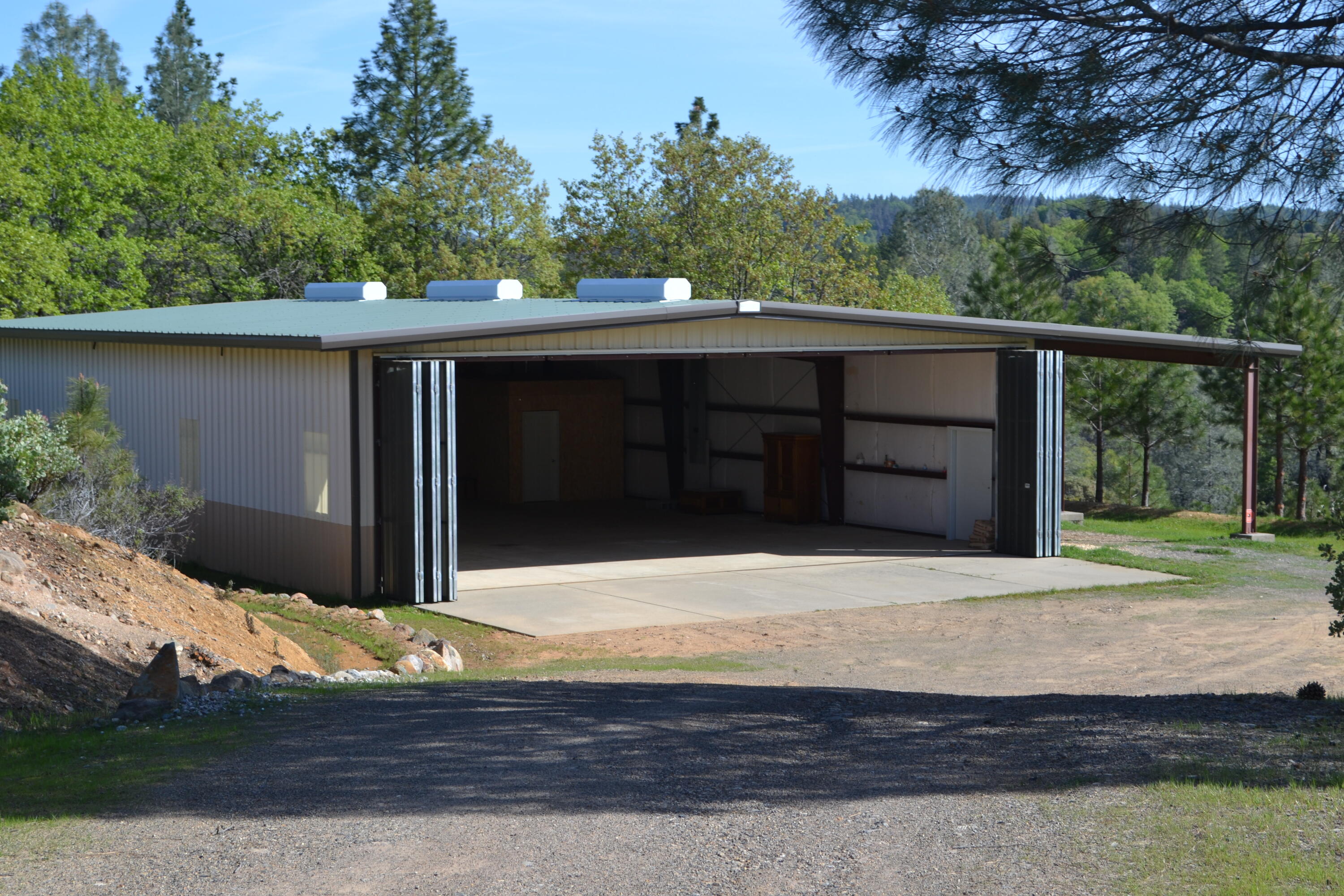 Backbone Road Bella Vista, CA 96008 - Photo 39 of 42 a front view of a house with a yard