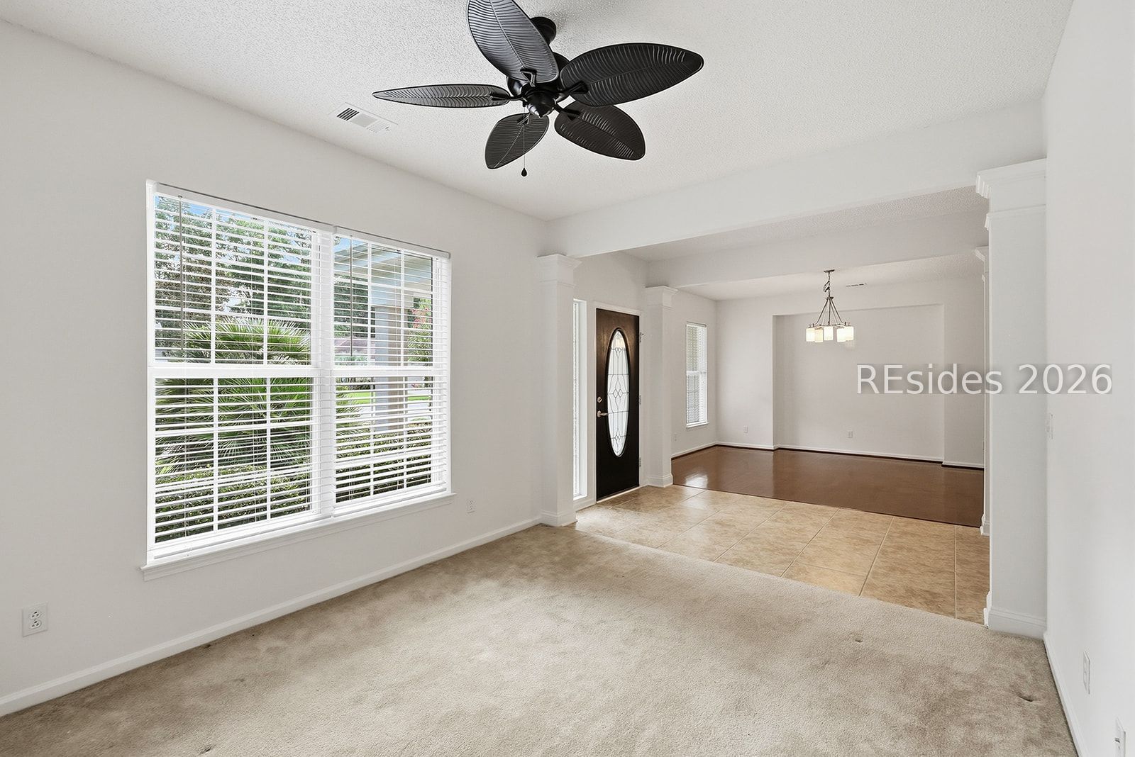 108 Landing Lane Bluffton, SC 29909 - Photo 27 of 63 Long view from living room to dining room