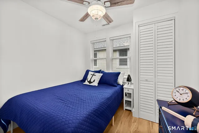 a view of a livingroom with furniture and wooden floor