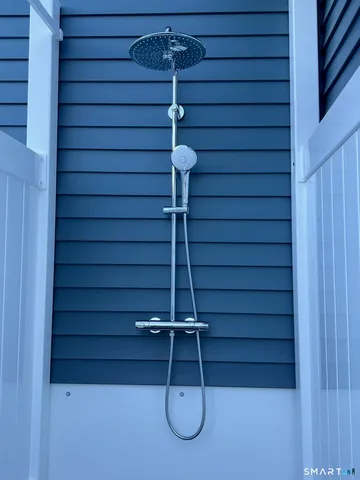 a house with a potted plant in front of a house
