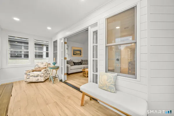 a living room with furniture and a table