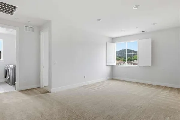 an empty room with windows