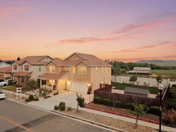 a view of a street with houses
