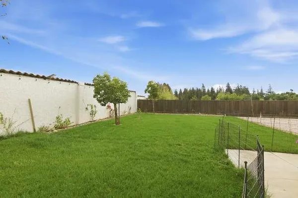 a view of a golf course with a lake