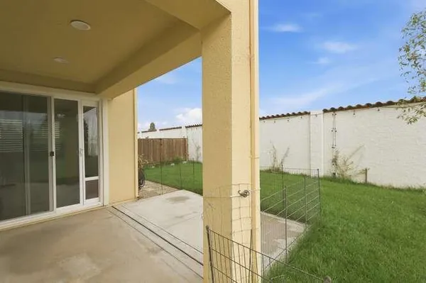 a house view with a outdoor space