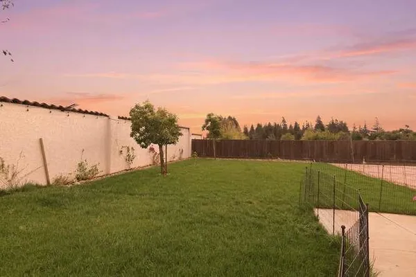 a view of a golf course with a lake