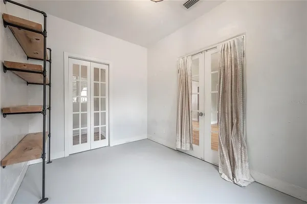 an empty room with windows