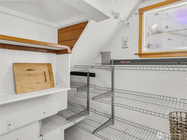 a bathroom with a toilet and a bathtub