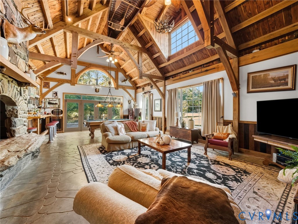 Vaulted beamed ceilings, carved concrete floors, a