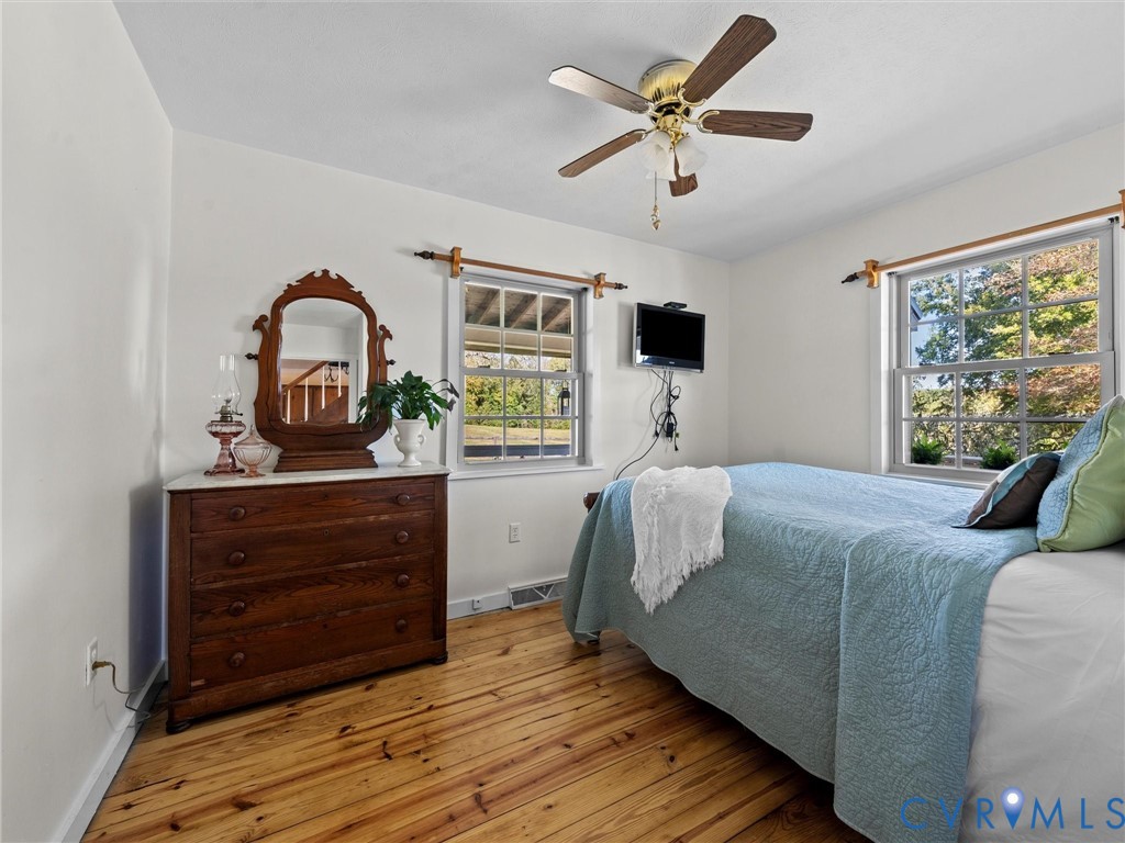 1024 Back Mountain Road Dillwyn, VA 23936 - Photo 32 of 50 a bedroom with a bed window and a dresser