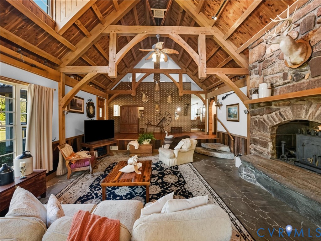1024 Back Mountain Road Dillwyn, VA 23936 - Photo 10 of 50 a living room with furniture and a flat screen tv