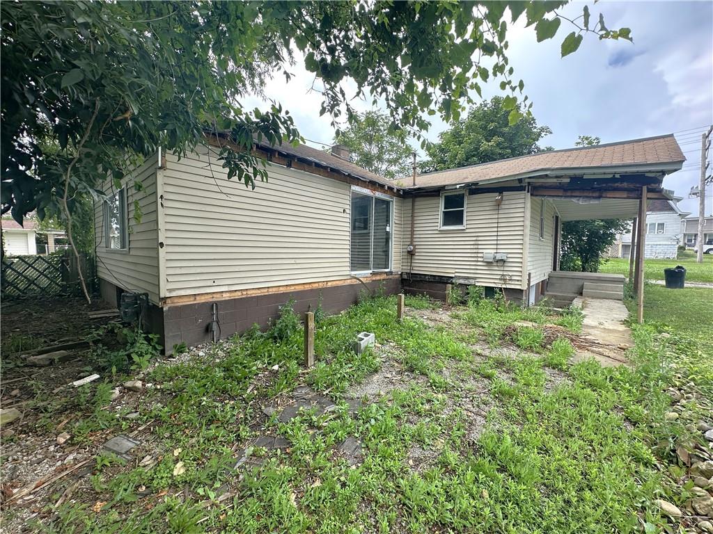 8 1/2 Apple Street Uniontown, PA 15401 - Photo 2 of 9 a backyard of a house with lots of green space