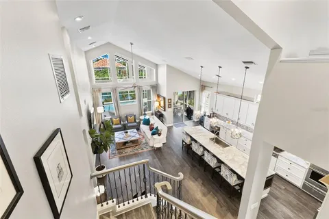 a view of a livingroom with workspace and a couch