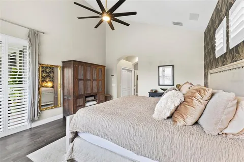 a view of a swimming pool with a porch