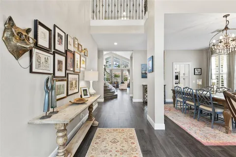 a living room with fireplace furniture and a flat screen tv