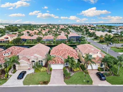 a terrace of a house with outdoor seating