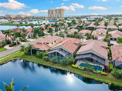 an aerial view of a houses with outdoor space